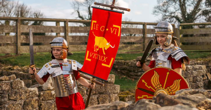 Two children dressed as Roman Soldiers at Binchester Roman Fort